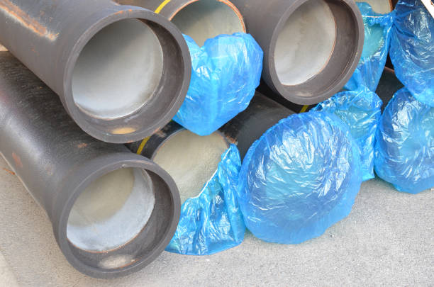 istock Water pipes with insulation stacking on street 1049891418