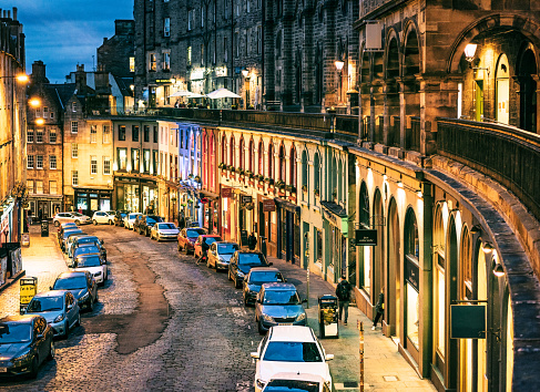 A view of the historic curving Victoria Street in the centre of Edinburgh's ancient Old Town.
