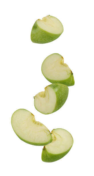 istock Falling (flying) pieces of Apple, isolated on white background. 1049901384