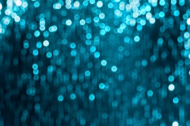 istock Glitter sparkling abstract blue bokeh defocused background 1049904846