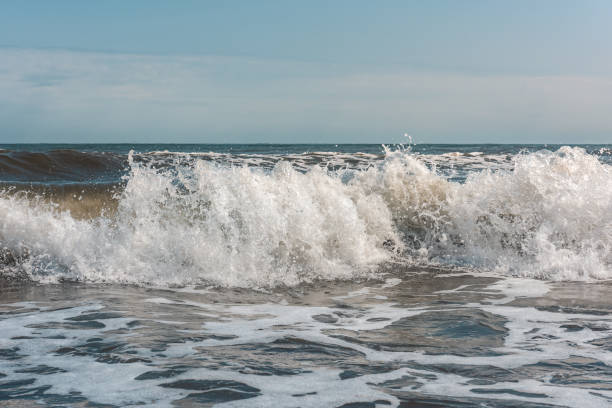 istock Powerful sea waves breaking, natural background 1049907324
