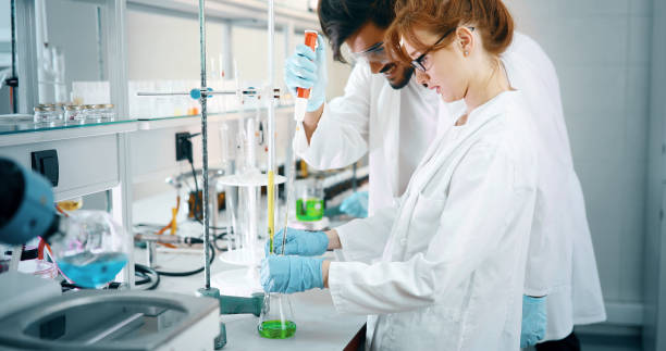 istock Young students of chemistry working in laboratory 1049913904