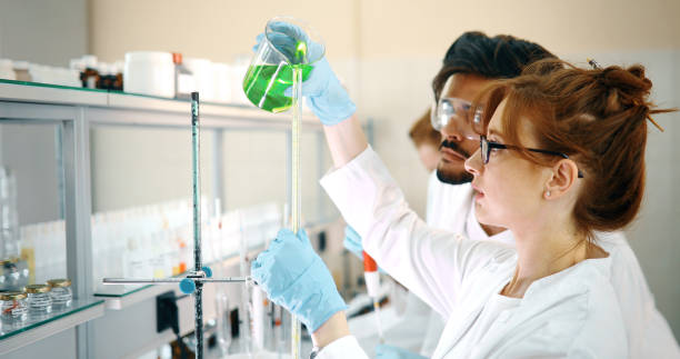istock Group of chemistry students working in laboratory 1049913918