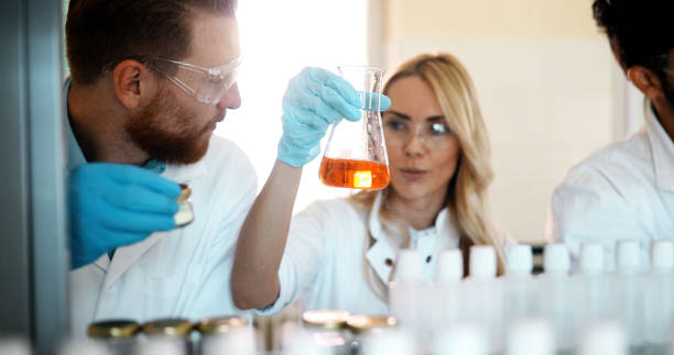 istock Young students of chemistry working in laboratory 1049913920