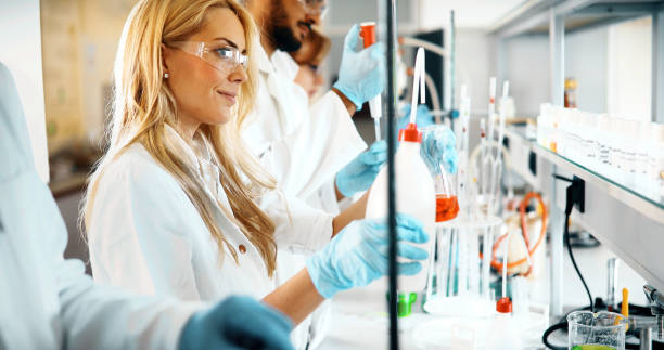 istock Group of chemistry students working in laboratory 1049913964