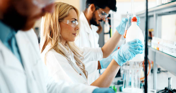 istock Young students of chemistry working in laboratory 1049913966