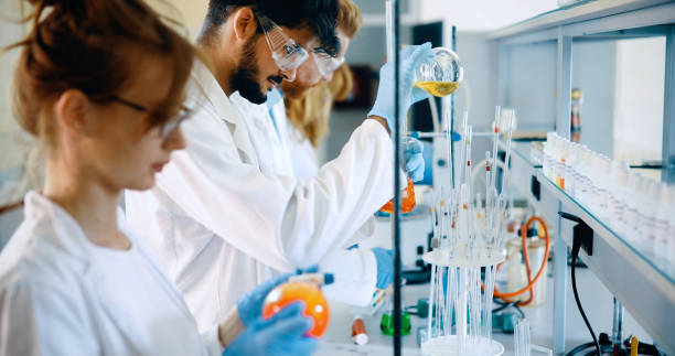 istock Young students of chemistry working in laboratory 1049913992