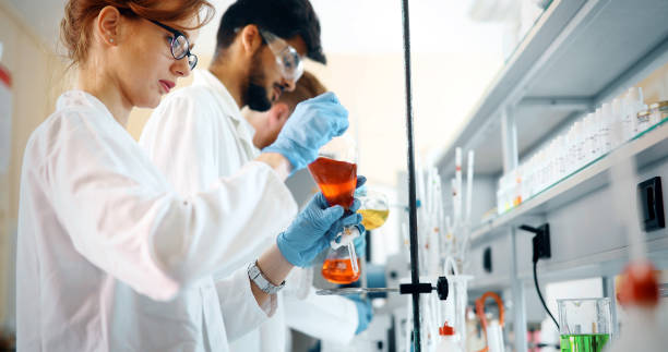 istock Group of chemistry students working in laboratory 1049913996
