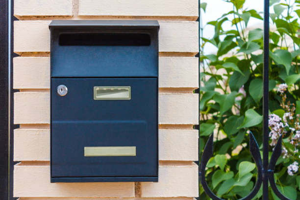 istock A beautiful mailbox hangs waiting for newspapers, parcels and letters. 1049922742
