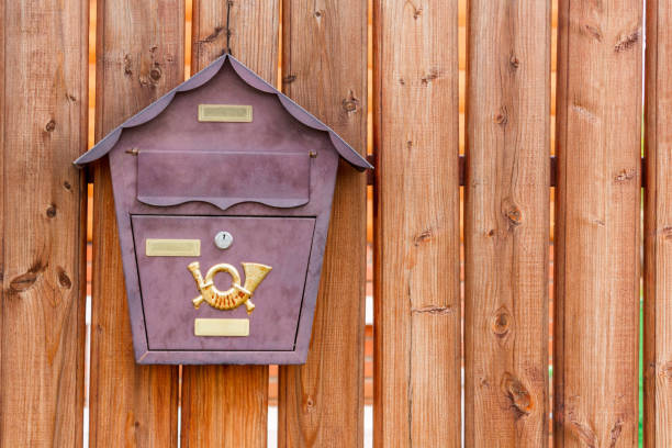 istock A beautiful mailbox hangs waiting for newspapers, parcels and letters. 1049922750
