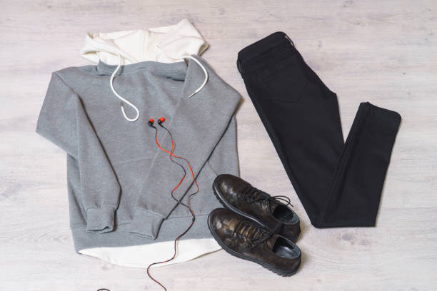 istock Teen clothing set: grey sweatshirt, black jeans and boots in military style 1049932548
