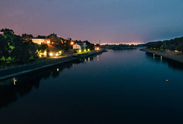 istock River in the evening reflections in night illumination 1049939274