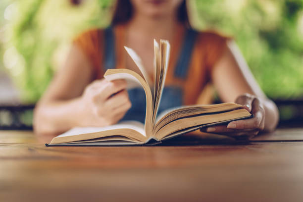 istock Girl reading a book 1049939442