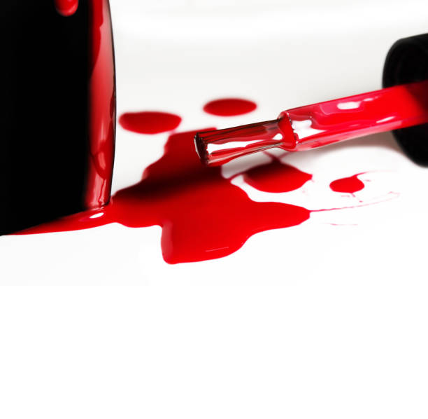 istock Red nail polish on a white background with space for text 1049942034