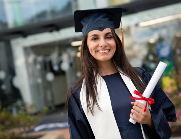 istock Happy female graduate student 1049942706