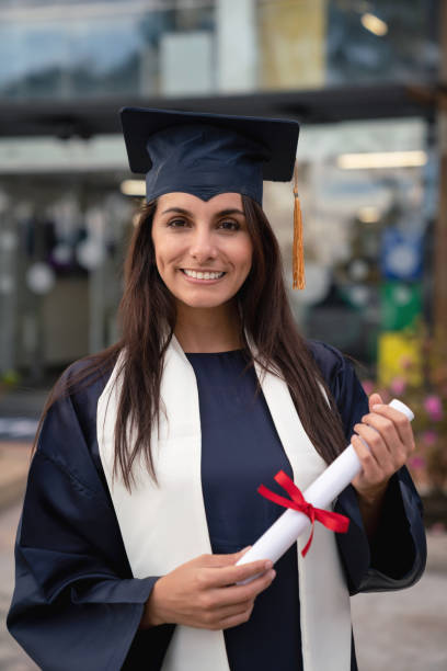istock Female student looking happy on graduation day 1049942716