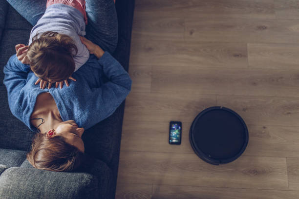 istock Mom and child relaxing at home 1049945764