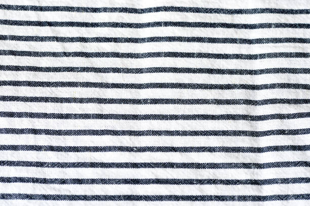 istock Blue and white striped textile background close up 1049949402