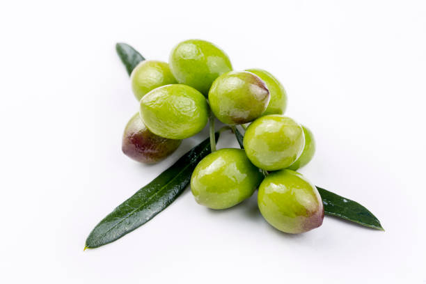 Green fresh olive on the white background
