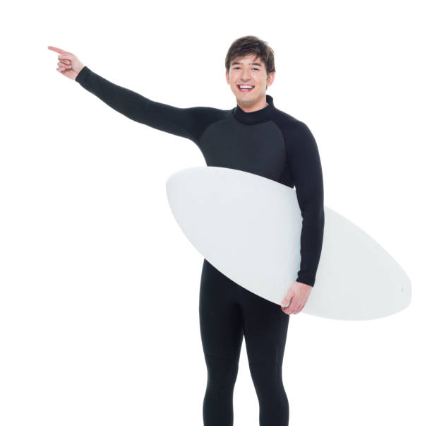 istock Handsome male surfer 1049949796