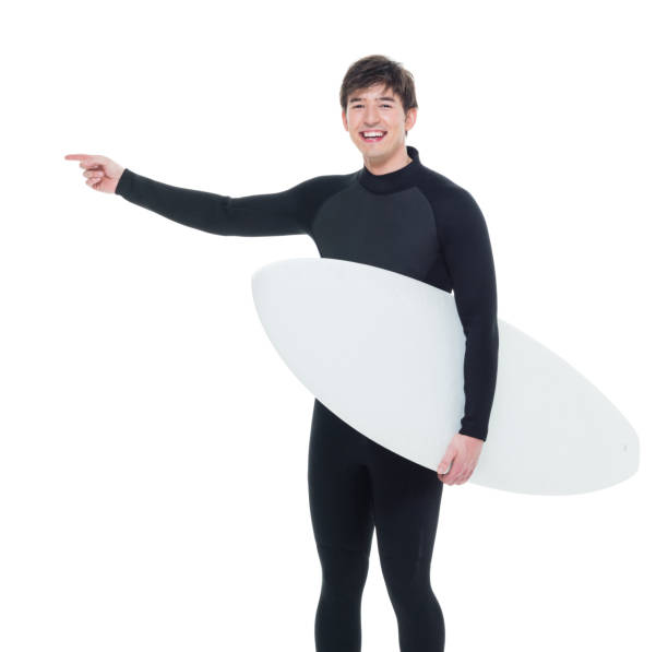 istock Handsome male surfer 1049949808