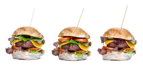 istock A cheese burger with lettuce, tomatoes and sesame bread bun 1049959150