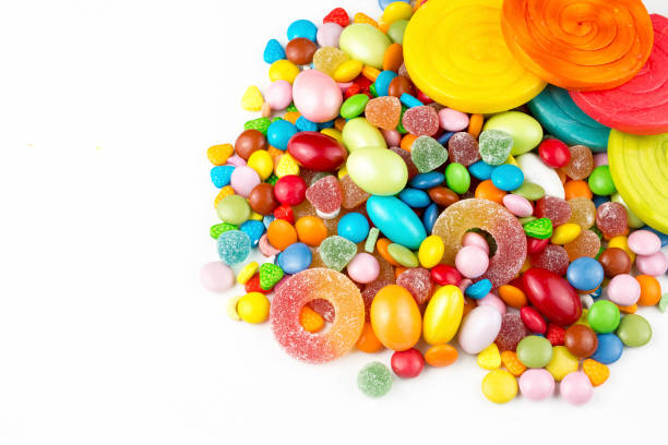 istock Colorful lollipops and different colored round candy. Top view. 1049962626