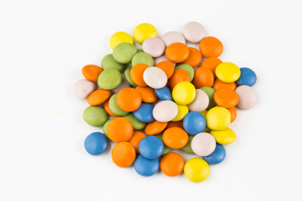 istock Colorful lollipops and different colored round candy. Top view. 1049962642