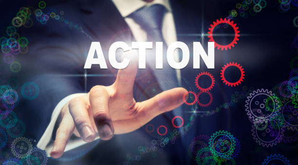 istock A businessman pressing a Action business concept 1049963606