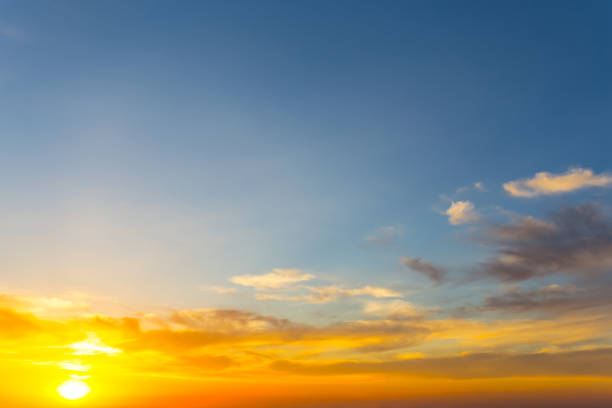 istock evening cloudy sky at the red sunset 1049969252