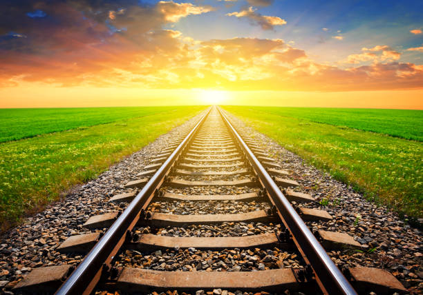istock railway leaving far away at the dramatic sunset 1049969492