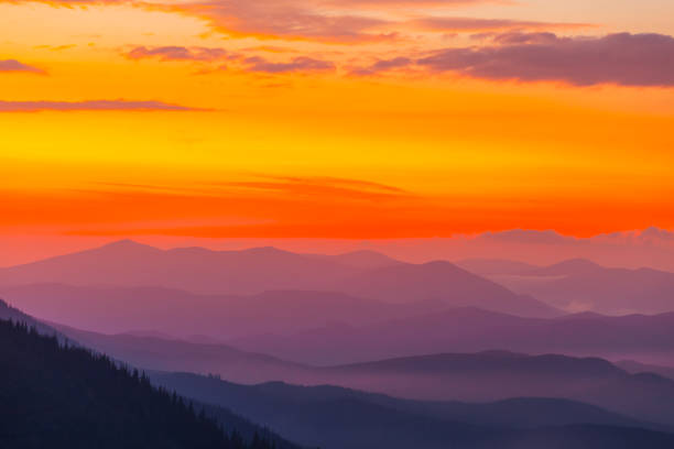 istock mountain ridge in a mist at the twilight 1049969568