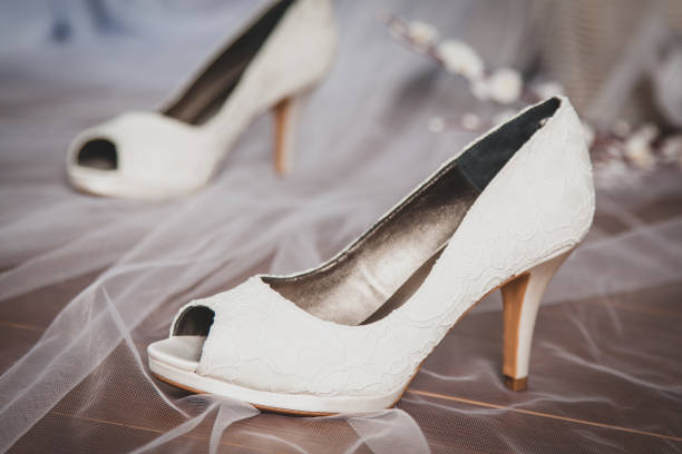 istock Wedding shoes with lace design 1049969900