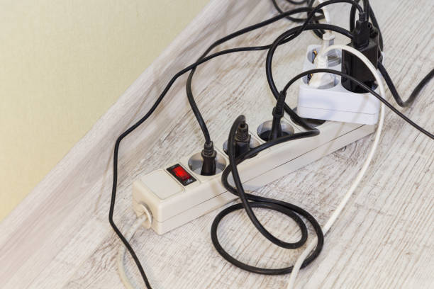 istock Lots of electrical outlets-enabled devices. Power saving 1049978580