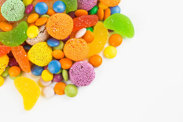istock Colorful lollipops and different colored round candy. Top view. 1049978592