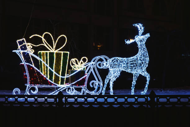 istock Christmas deer with gifts 1049979198