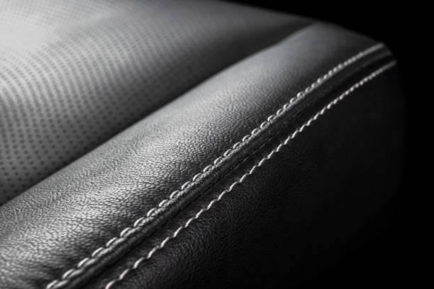 istock Car inside. Interior of a car. Comfortable leather seats. Perforated leather. Car interior details. Car detailing 1049982126
