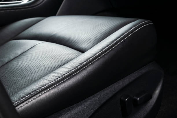 istock Car inside. Interior of a car. Comfortable leather seats. Perforated leather. Car interior details. Car detailing 1049982336