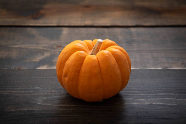 istock isolated orange pumpkin 1049990950