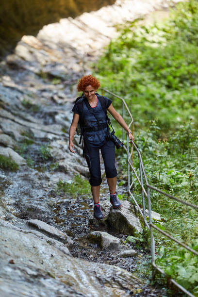 istock Woman hiking into the mountains 1049994272