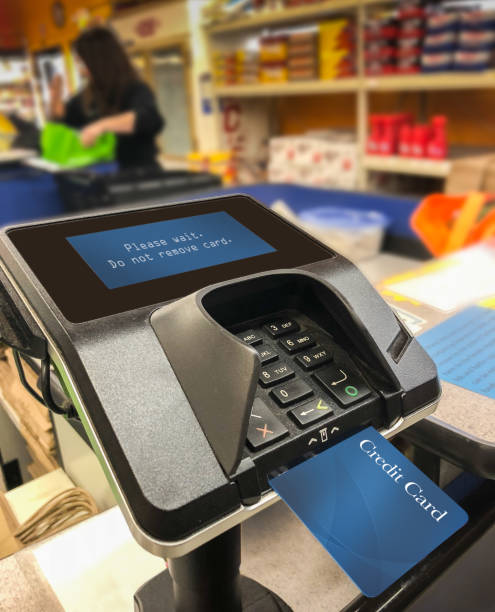 istock Credit card reader payment terminal in grocery store 1050000432