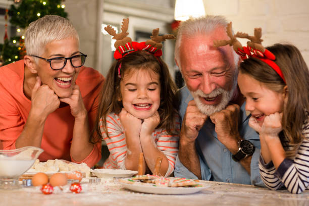istock Family smiling and looking at cookies 1050000528