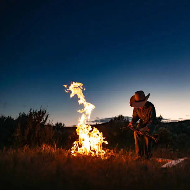 Photo of Cowboy campfire at twilight