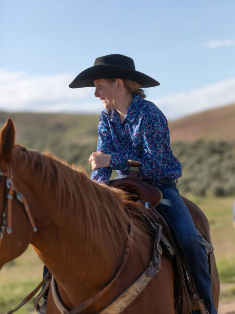 istock Cowgirl Horseback Riding 1050000772