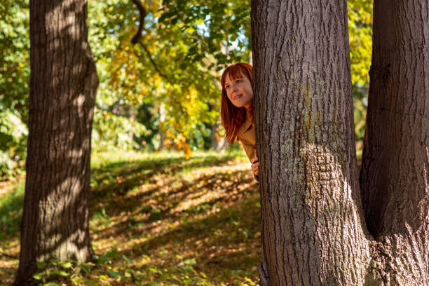 istock Smiling ginger girl in nature 1050009452