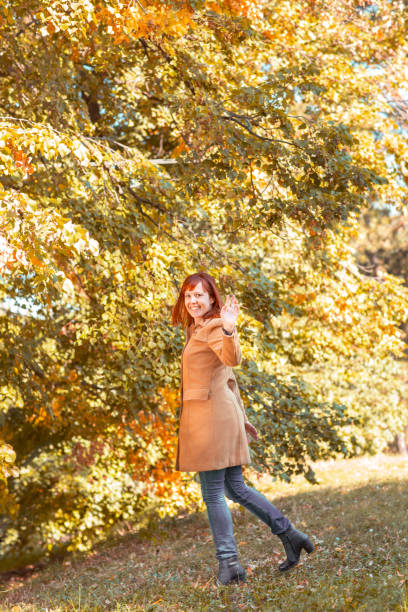 istock Smiling ginger girl in nature 1050009814