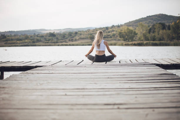 istock Pretty woman doing yoga 1050026738