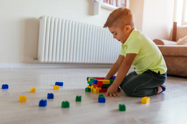 istock Playing with toys on the floor 1050032492