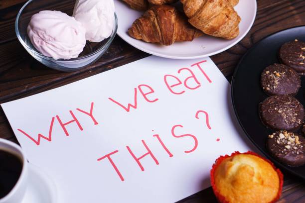 istock Inscription Why we eat this and sweets on table 1050035336