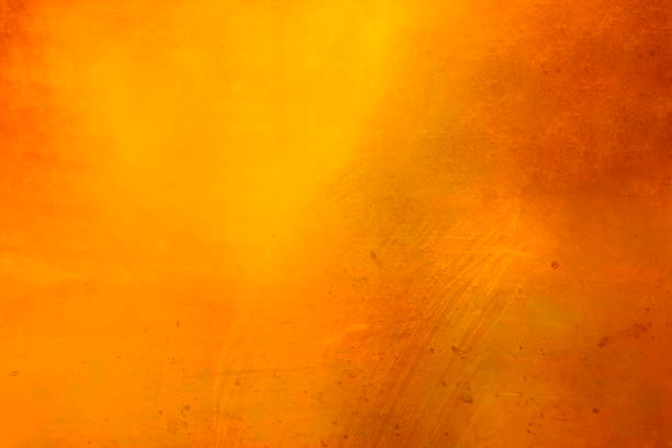 istock bronze yellow golden distressed metal alloy background surface 1050037846